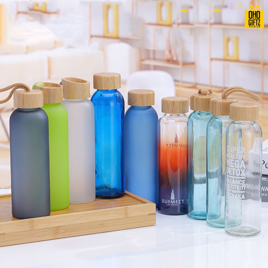 ขวดแก้วฝาไม้ไผ่ สกรีนชื่อ เลเซอร์โลโก้ฟรี  ทำเป็นของพรีเมี่ยมได้