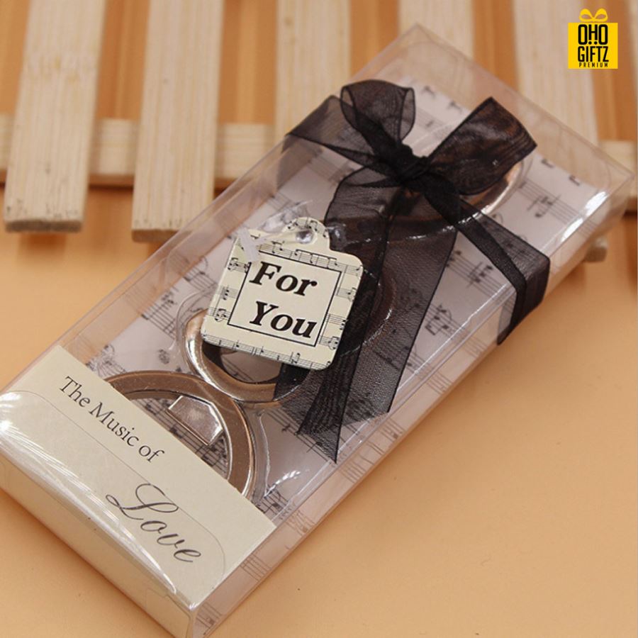 ที่เปิดขวดรูปกุญแจซอล พิมพ์สติกเกอร์ชื่อฟรี ทำเป็นของพรีเมี่ยม ของชำร่วยงานเเต่งงานได้