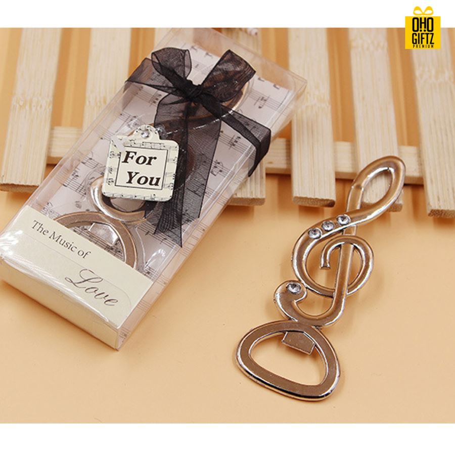 ที่เปิดขวดรูปกุญแจซอล พิมพ์สติกเกอร์ชื่อฟรี ทำเป็นของพรีเมี่ยม ของชำร่วยงานเเต่งงานได้