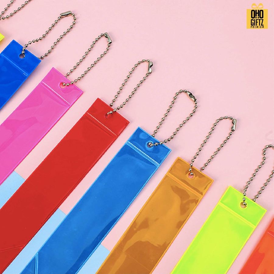 พวงกุญแจสะท้อนแทงทรงริบบิ้นยาว PVC สกรีนโลโก้ ทำเป็นของพรีเมี่ยม ของชำร่วยได้