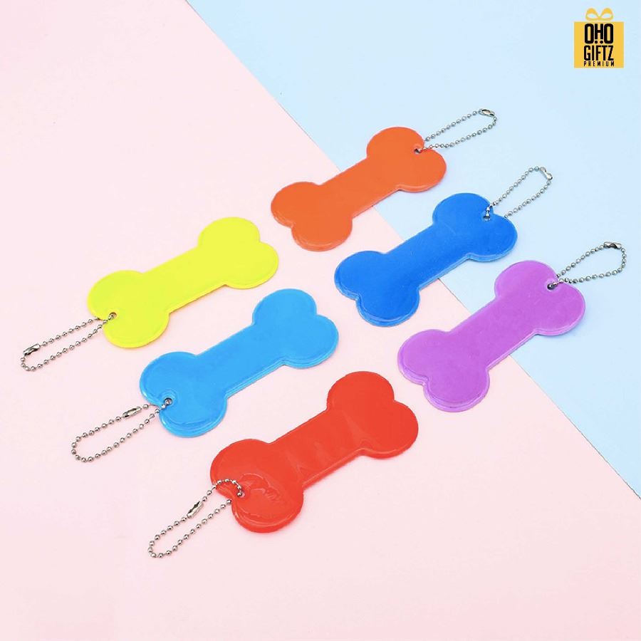 พวงกุญแจสะท้อนแสงทรงกระดูก PVC  สกรีนโลโก้ ทำเป็นของพรีเมี่ยม ของชำร่วยได้