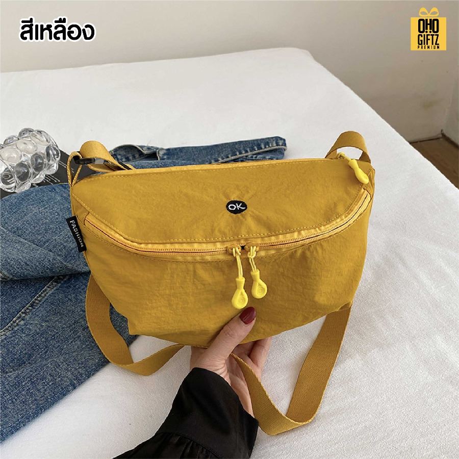 กระเป๋าสะพายทรงเกี๊ยว สกรีนโลโก้ ทำเป็นของพรีเมี่ยมได้