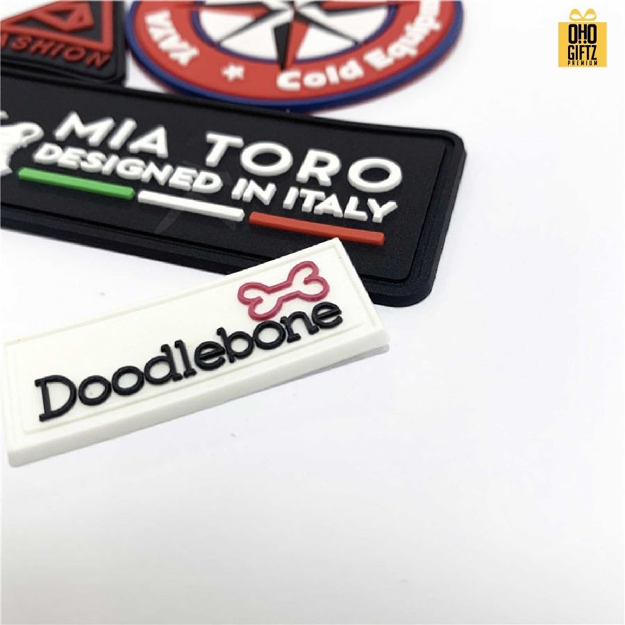 รับผลิตป้ายแท็กยางติดเสื้อ กระเป๋า สกรีนโลโก้ ทำเป็นของพรีเมี่ยม ของชำร่วยได้