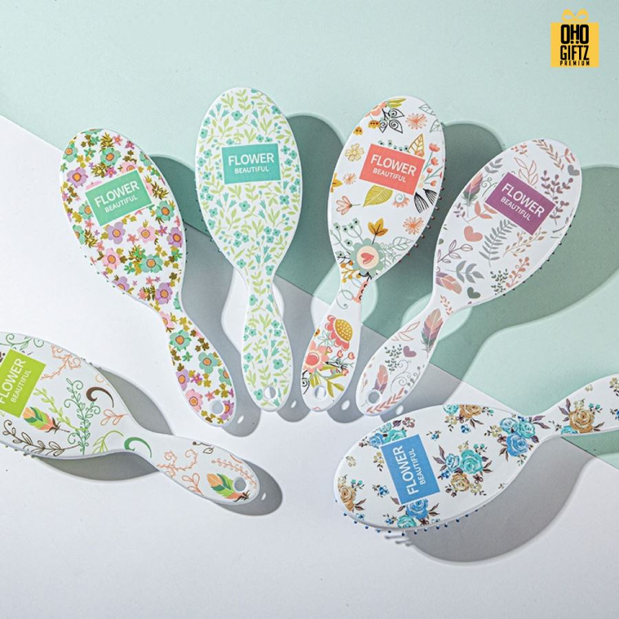 หวีแปรงลายดอกไม้คละลาย สกรีนโลโก้ ทำเป็นของพรีเมี่ยมได้