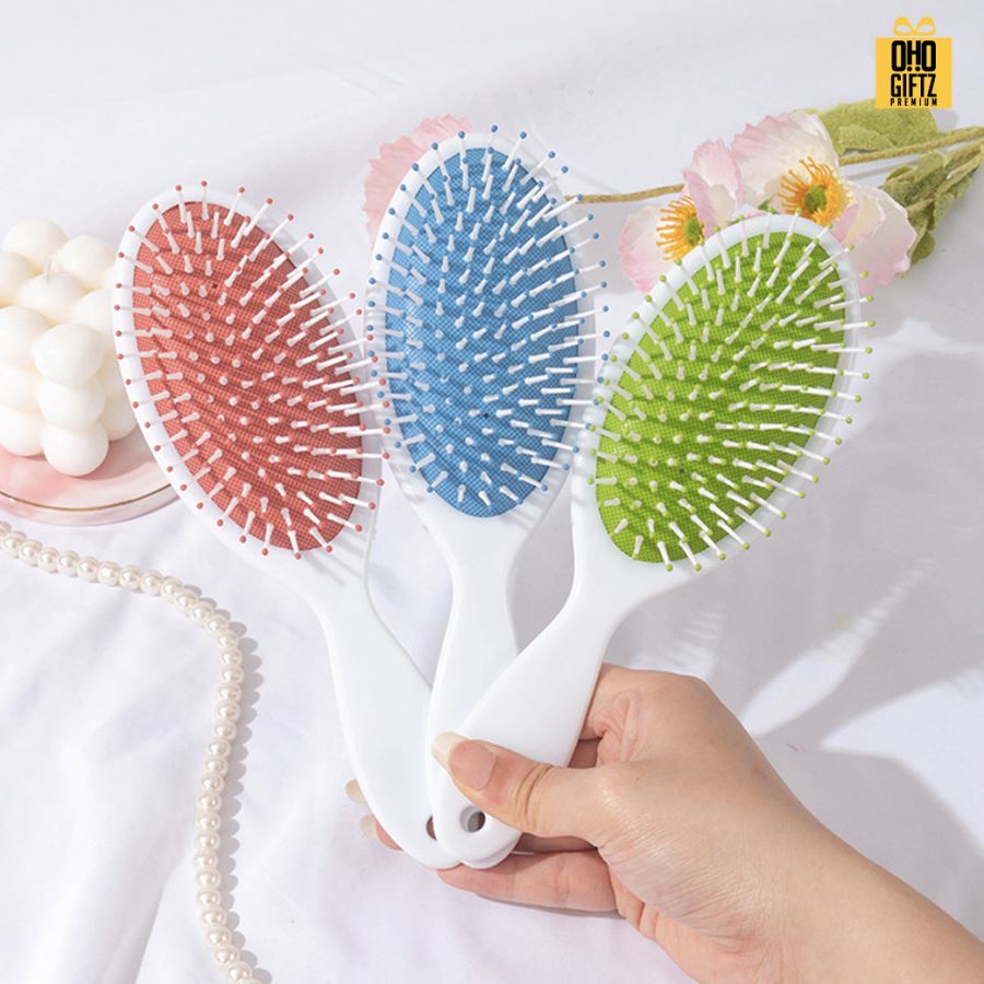 หวีแปรงลายดอกไม้คละลาย สกรีนโลโก้ ทำเป็นของพรีเมี่ยมได้