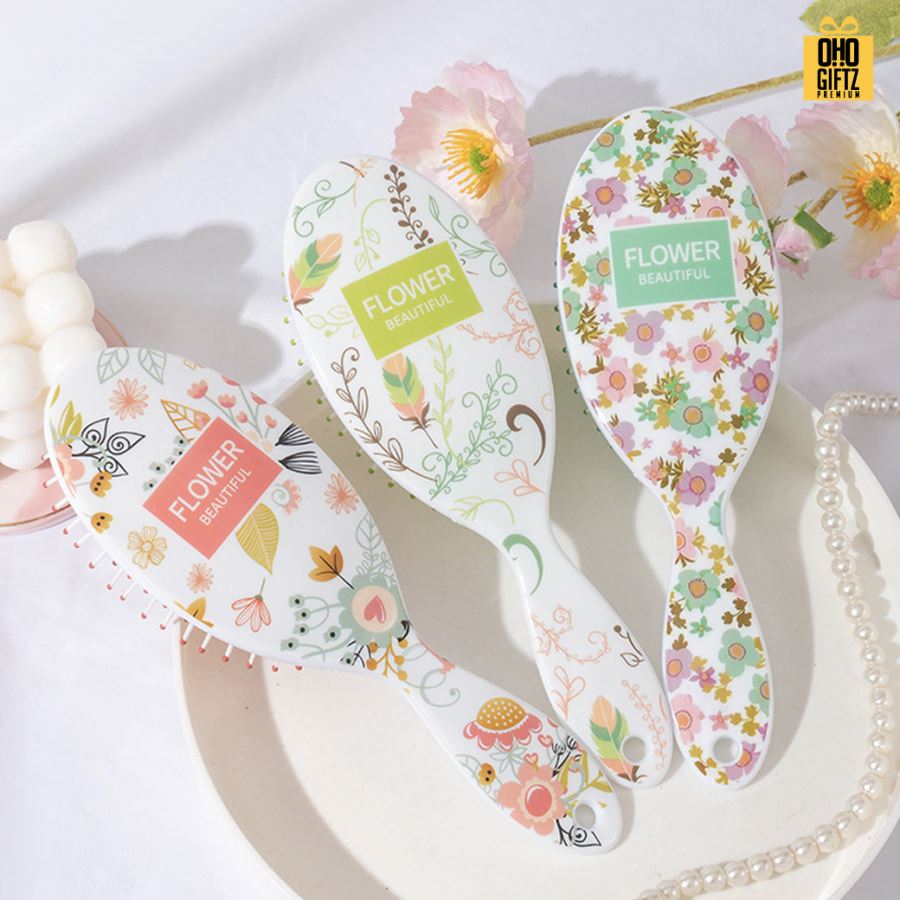 หวีแปรงลายดอกไม้คละลาย สกรีนโลโก้ ทำเป็นของพรีเมี่ยมได้