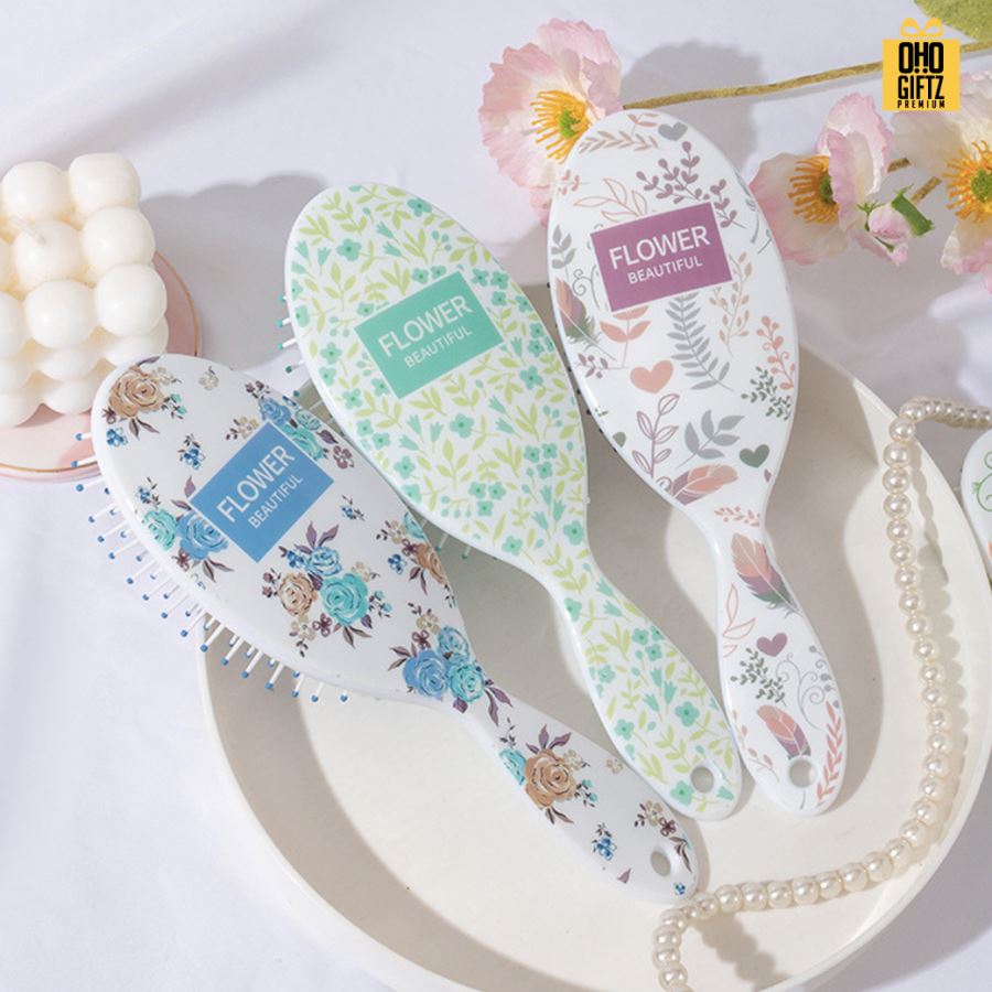 หวีแปรงลายดอกไม้คละลาย สกรีนโลโก้ ทำเป็นของพรีเมี่ยมได้