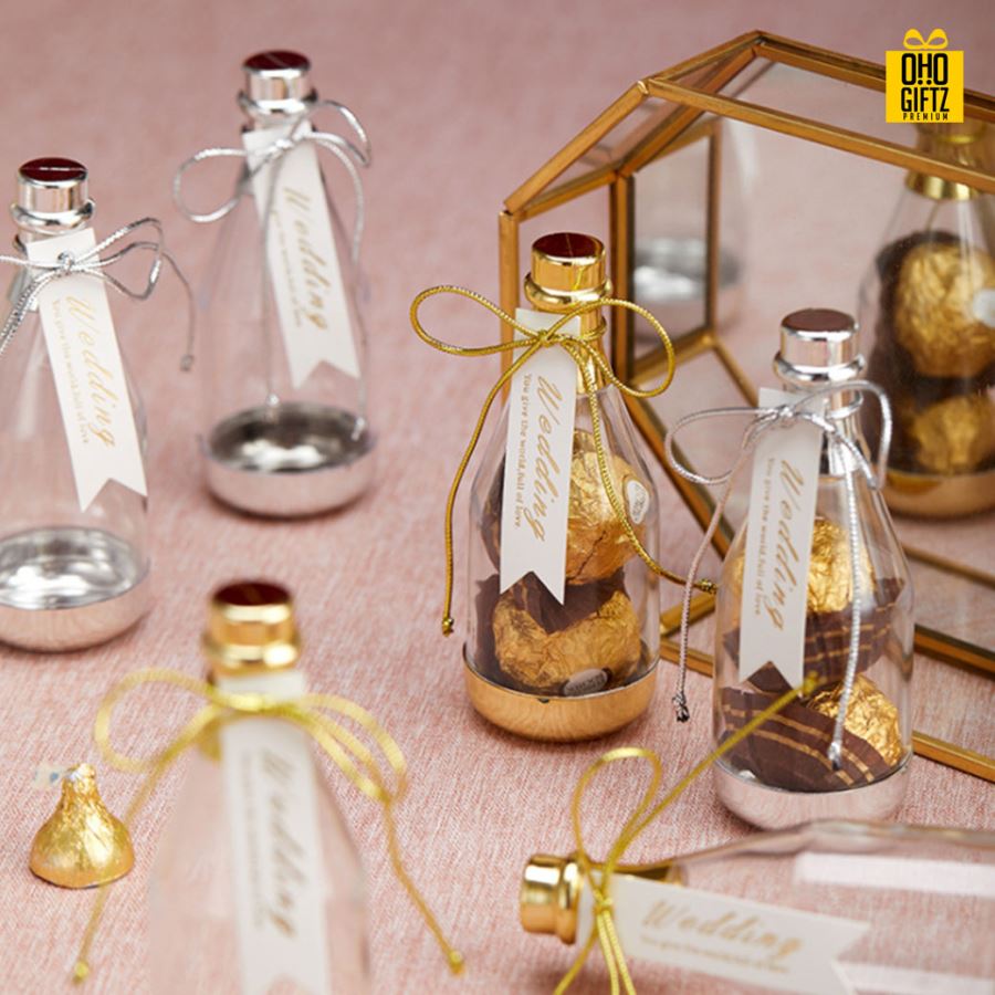 ขวดใส่ขนมพลาสติก พิมพ์สติกเกอร์ชื่อฟรี ทำเป็นของพรีเมี่ยม ของชำร่วยงานเเต่งงานได้
