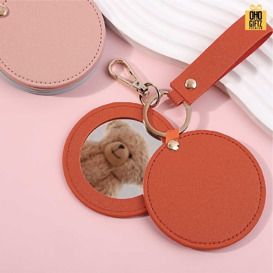 พวงกุญแจหนังกระจก PU สกรีนโลโก้ ทำเป็นของพรีเมี่ยม ของชำร่วยได้