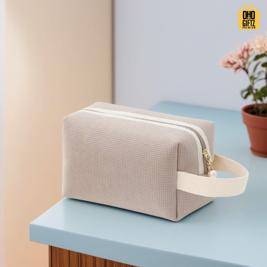 กระเป๋าเครื่องสำอางผ้าลูกฟูก สกรีนโลโก้  ทำเป็นของพรีเมี่ยมได้