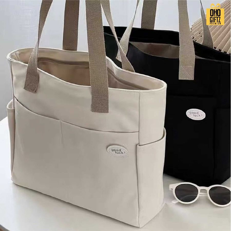 กระเป๋าสะพายผ้าแคนวาส จุของเยอะ สกรีนโลโก้ ทำเป็นของพรีเมี่ยมได้